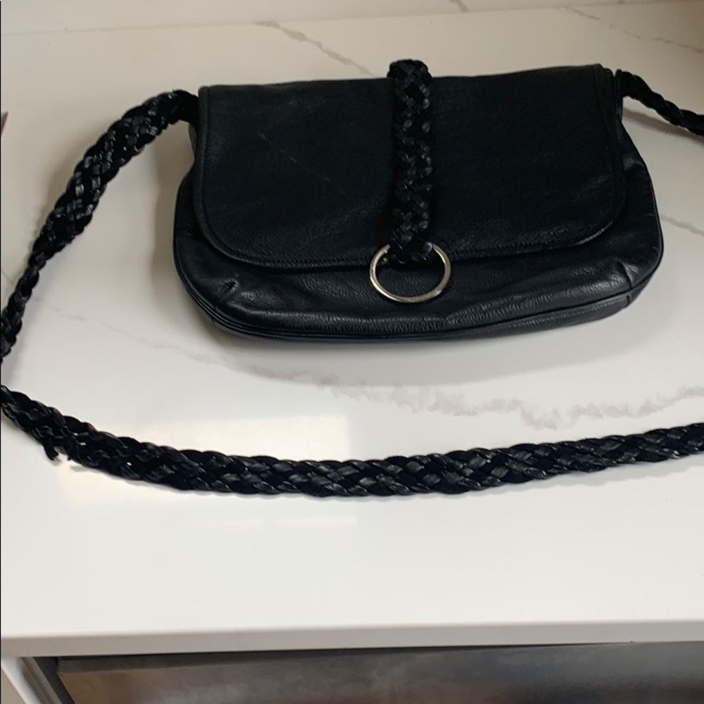 Charm and Luck black leather messenger bag